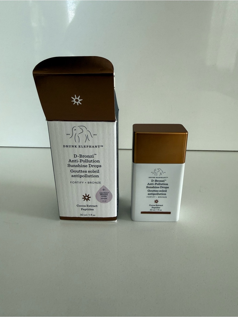 Drunk Elephant D-Bronzi Anti Pollution Sunshine Bronzing Drops with peptides